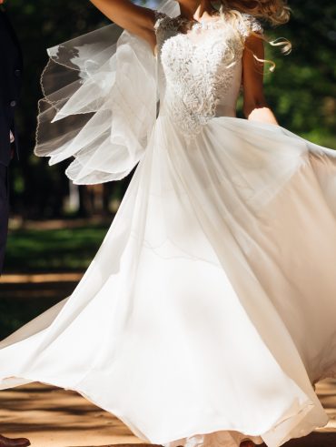 Eco-conscious bride in her sustainable wedding gown