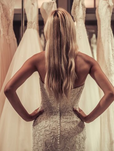 Bride shopping for sample dress.