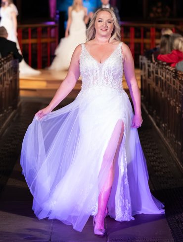Plus size bride in an affordable designer pre-loved dress